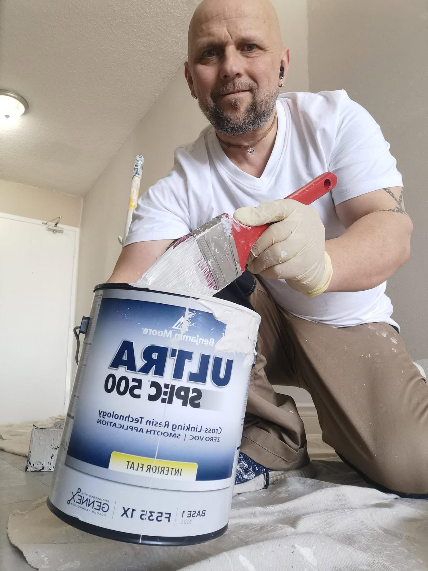 David Kropacek, owner of The Painting Guy, on the job in Hamilton